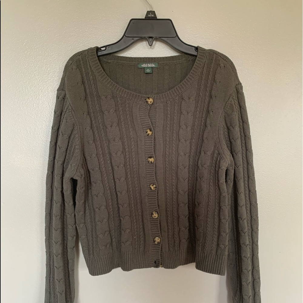 Green button up sweater